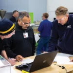 aim instructors interacting with students